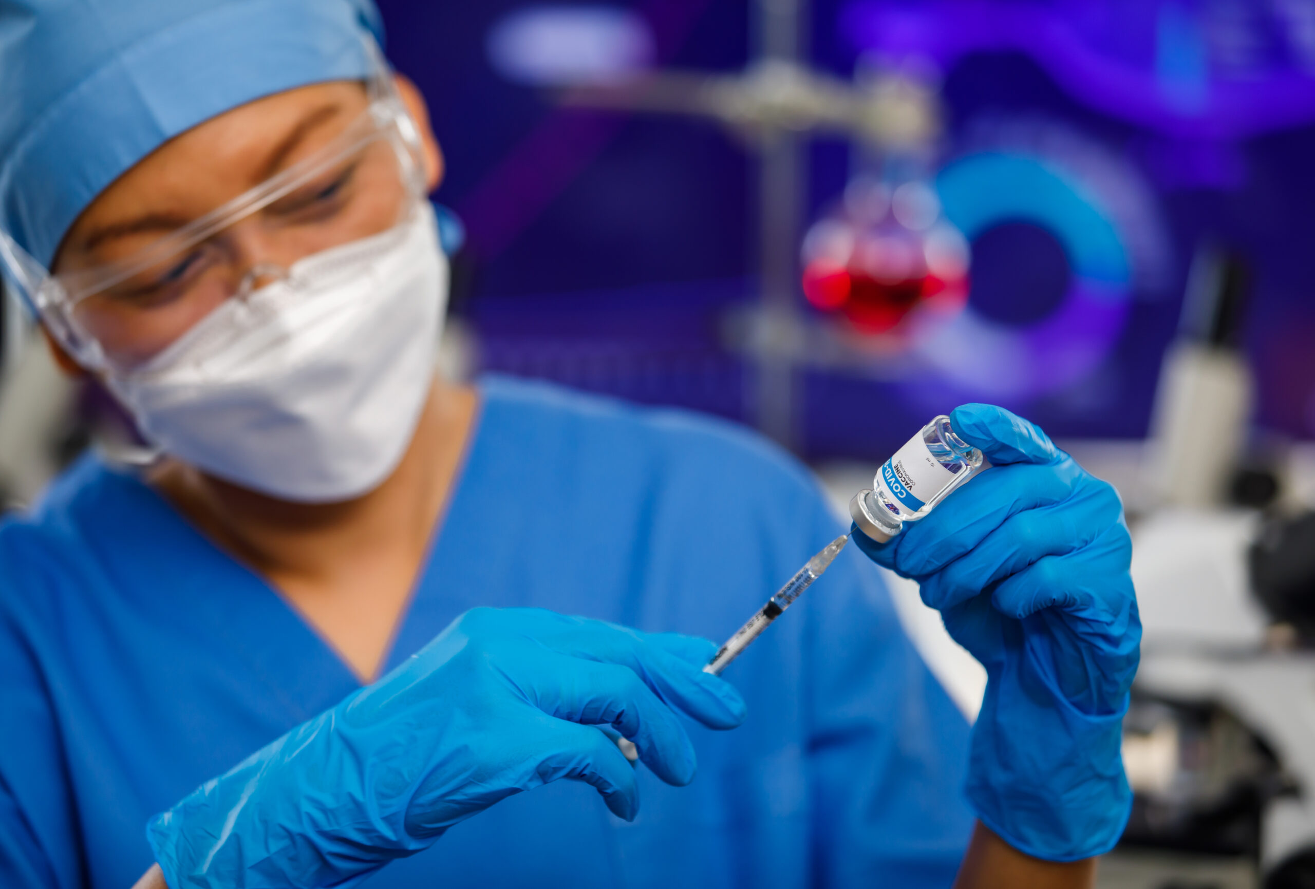 Medical people in blue uniform clothes wearing face hygiene mask
